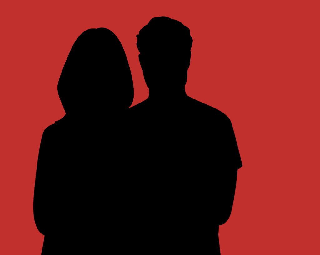 Schwarze Silhouette einer Frau und eines Mannes auf rotem Hintergrund